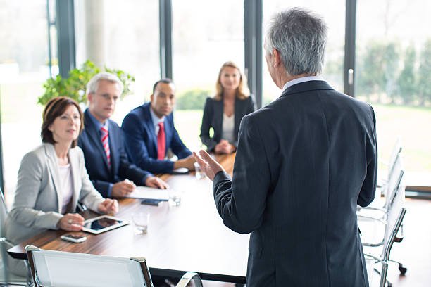 Business man giving a presentationhttp://bit.ly/1baBzlj